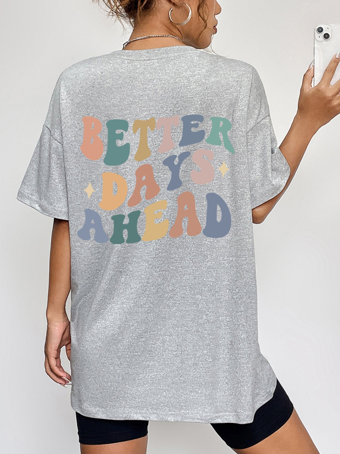 Better Days Ahead Graphic T-Shirt with colorful text on gray fabric, 100% polyester, slightly stretchy.