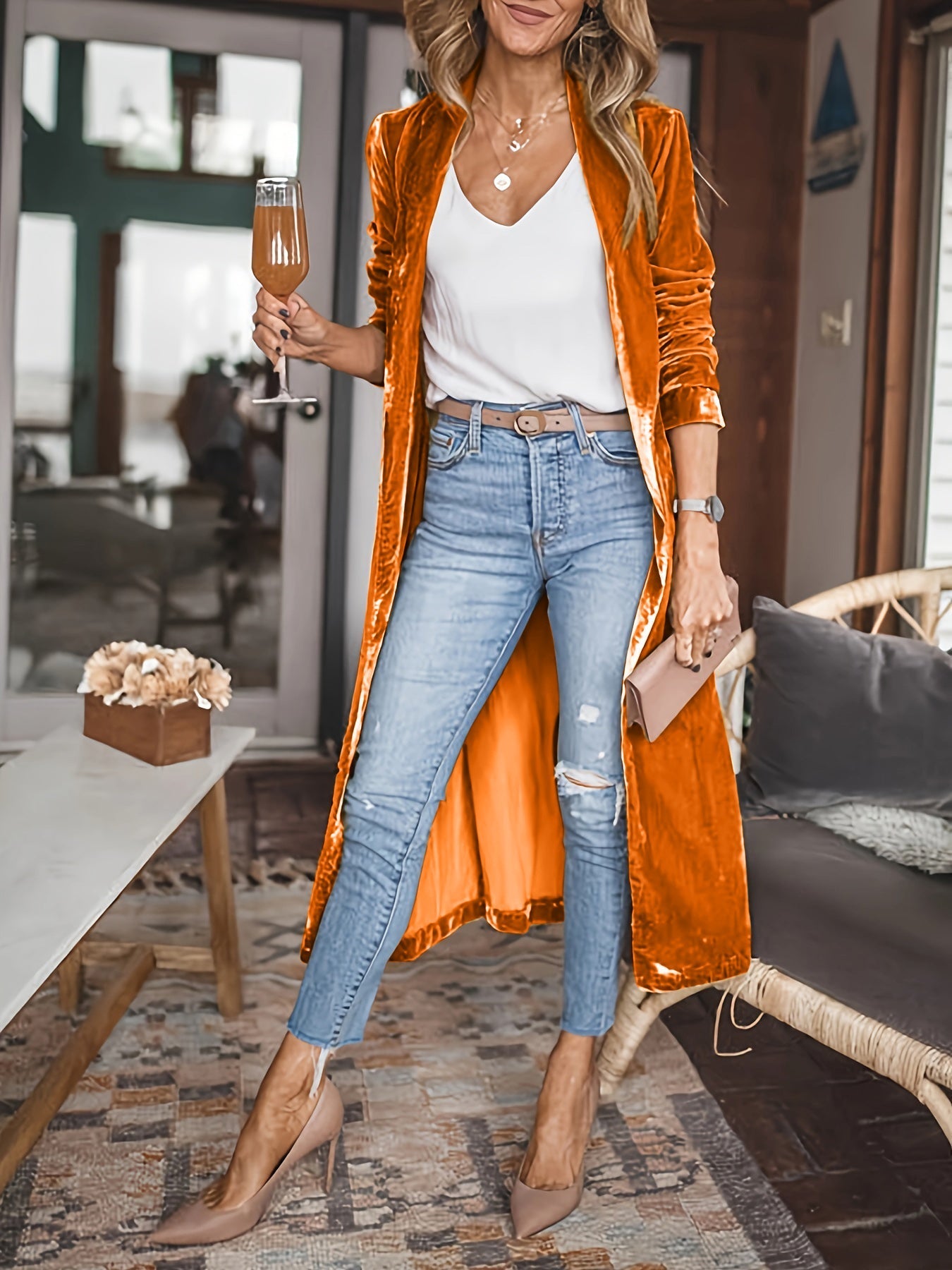 Open Front Long Sleeve Coat in orange, polyester material, styled with white top and jeans.