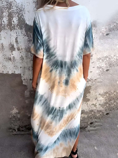 Tie-dye maxi dress with pockets, lightweight and stretchy fabric, ideal for warm weather.