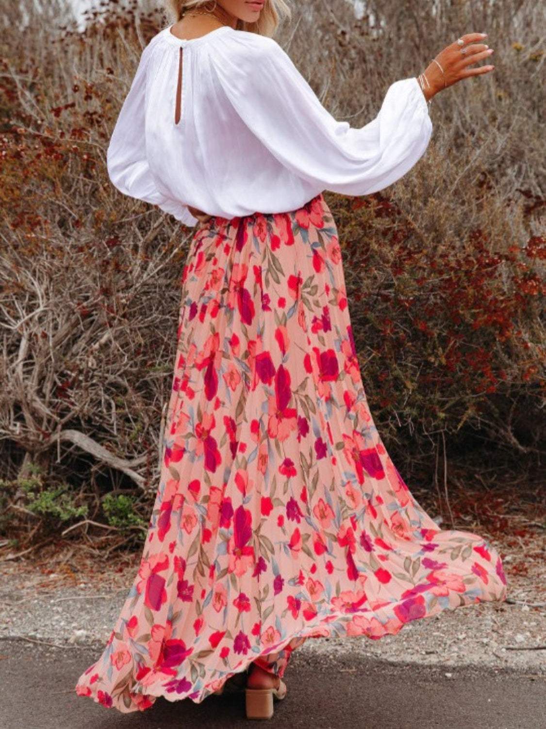 Floral Print Boho Pleated Maxi Skirt with vibrant colors and flowing design.