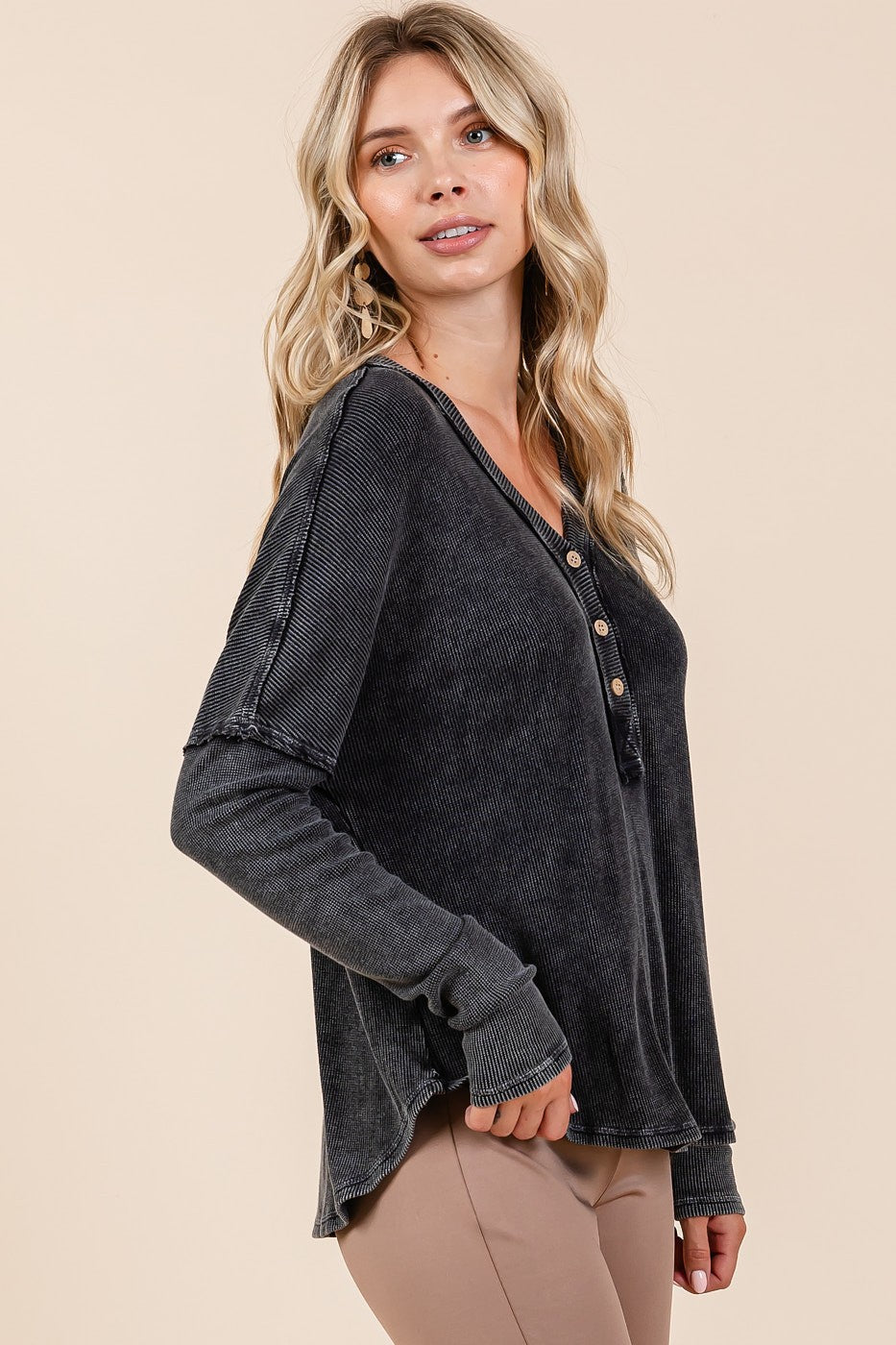 Boho washed v-neck long sleeve blouse with buttoned detailing.