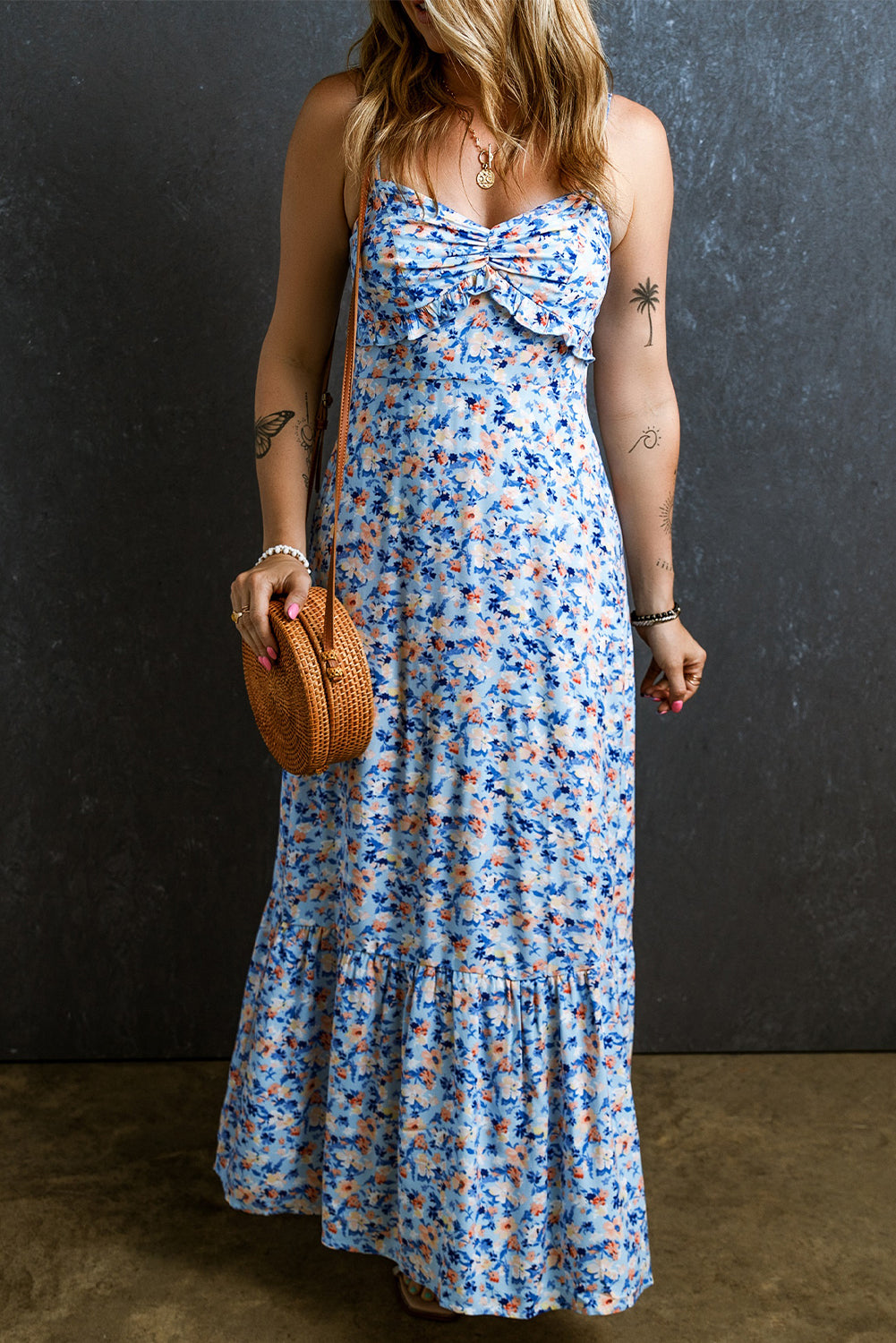 Sky blue floral print ruffled ruched maxi dress with adjustable straps and smocked back detailing.