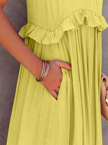 Ruffled sleeveless tiered maxi dress with pockets in yellow, close-up view.