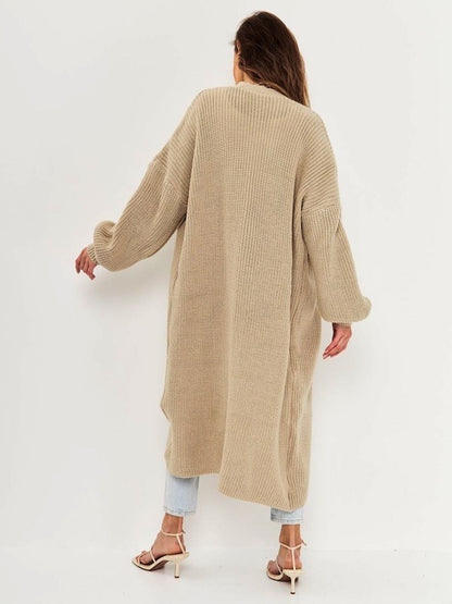 Open front long sleeve longline cardigan in beige, featuring moderate stretch and made from 100% polyester.