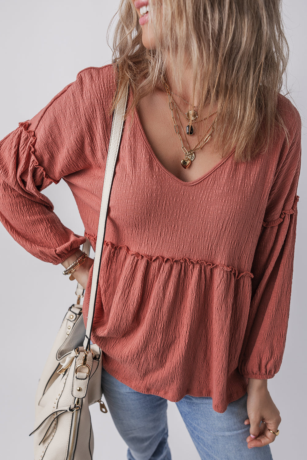 Boho frill long sleeve blouse in rust with slightly stretchy fabric.