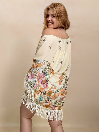 Plus size fringe printed open front cardigan with floral design and tassel hem.