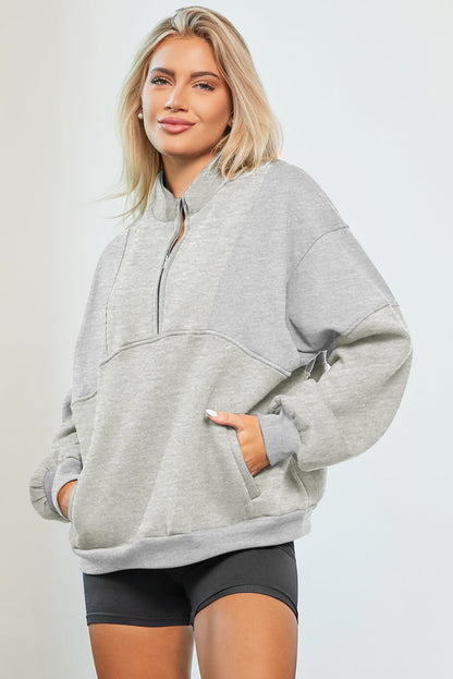 Oversized Half Zip Dropped Shoulder Sweatshirt in gray with pockets and no stretch, polyester-cotton blend.