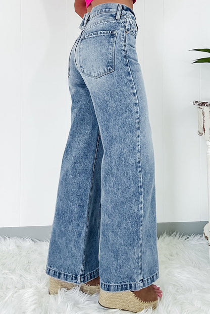 Dusk blue central seamed wide leg high waist jeans with deep pockets.