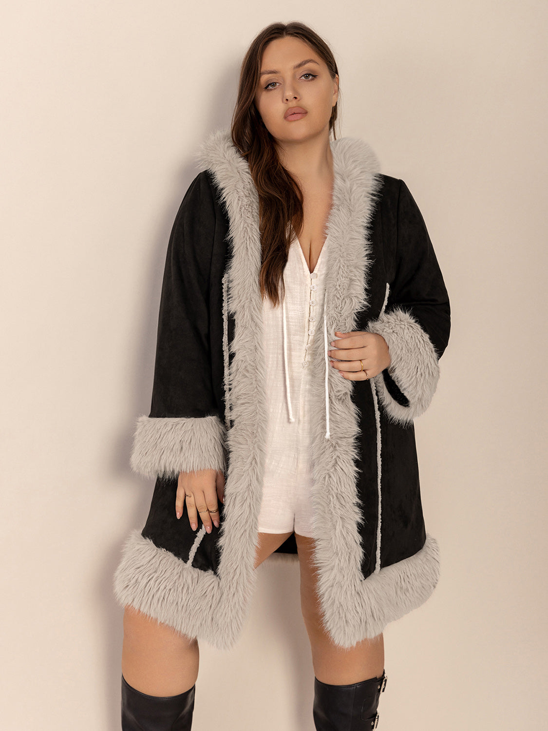 Plus size fuzzy trim hooded coat with open front and long sleeves.