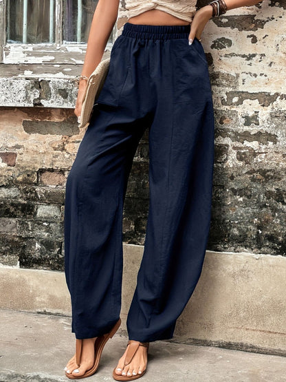 Elastic waist pants with pockets, navy blue, polyester-spandex blend, casual wear.