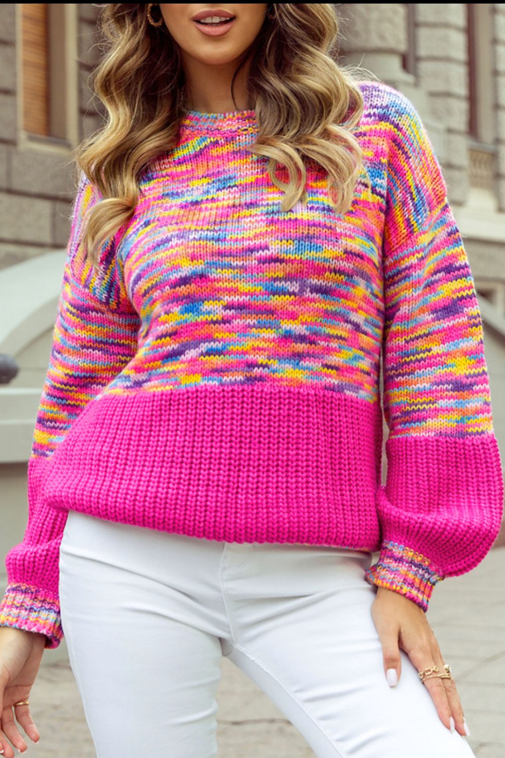 Rainbow confetti print sweater, pink and multicolored, slightly stretchy acrylic material.