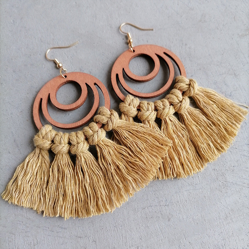 Boho chic tassel detail geometric earrings in copper and cotton.