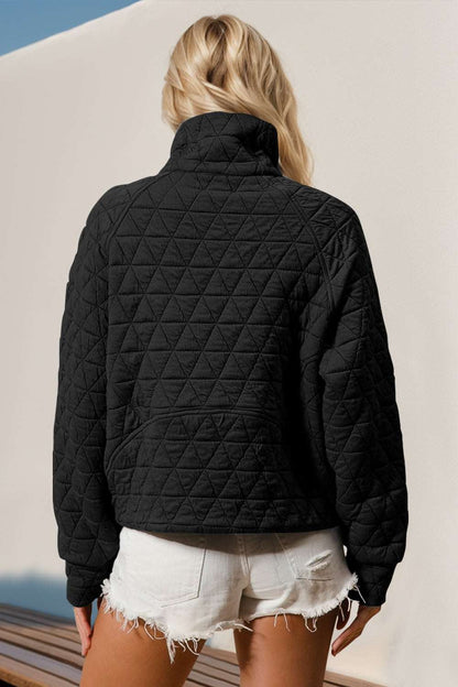 Half zip long sleeve quilted black sweatshirt with pocket, women's style.