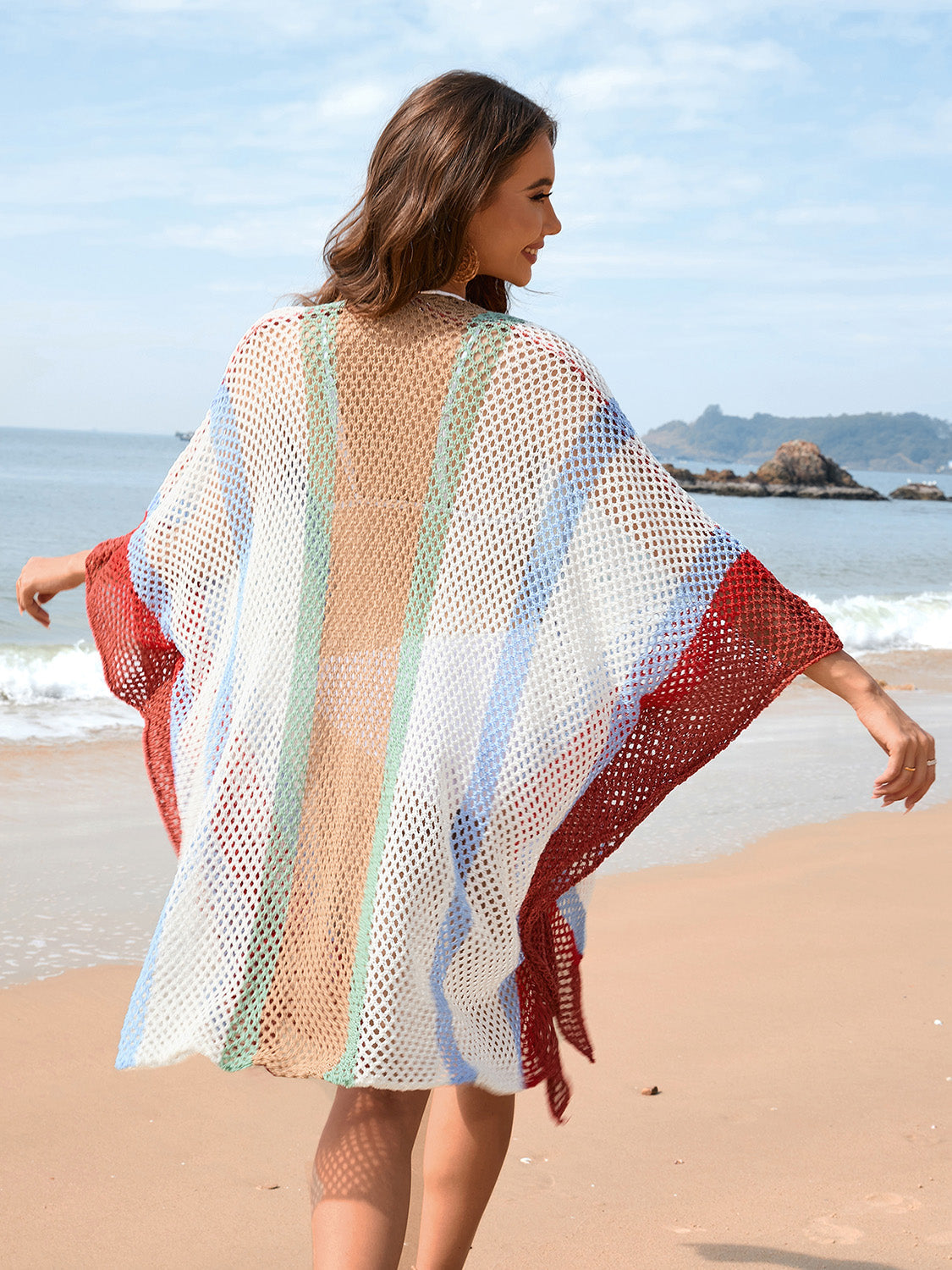 Color block plunge beach dress with openwork design, semi-sheer and slightly stretchy acrylic material.