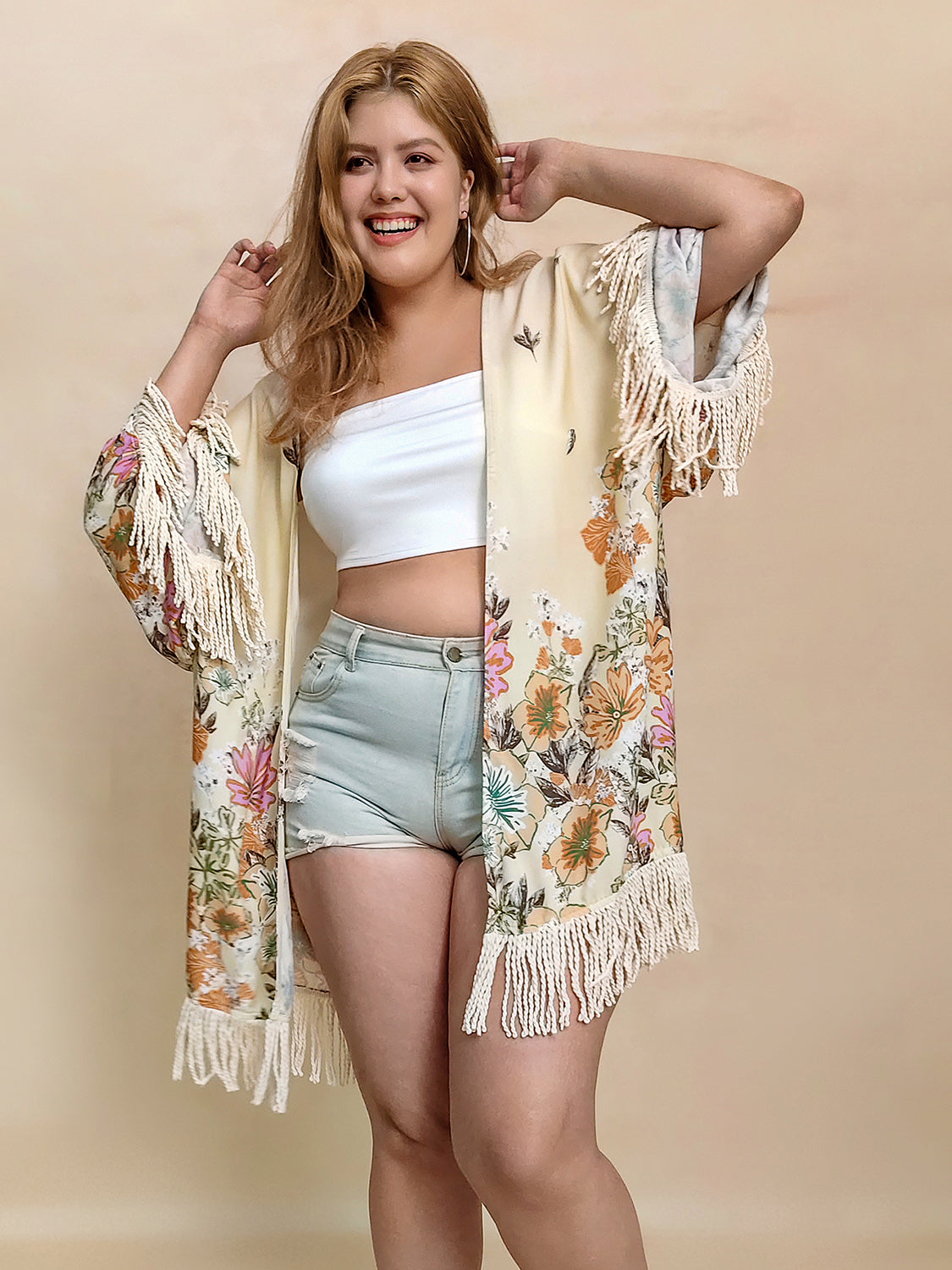 Plus Size Fringe Printed Open Front Cardigan with floral design, thin material, and fringe details.