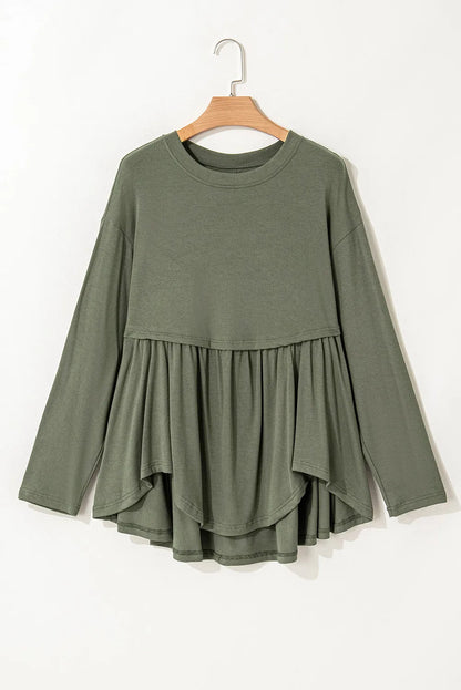 Plus size peplum round neck long sleeve blouse in green.