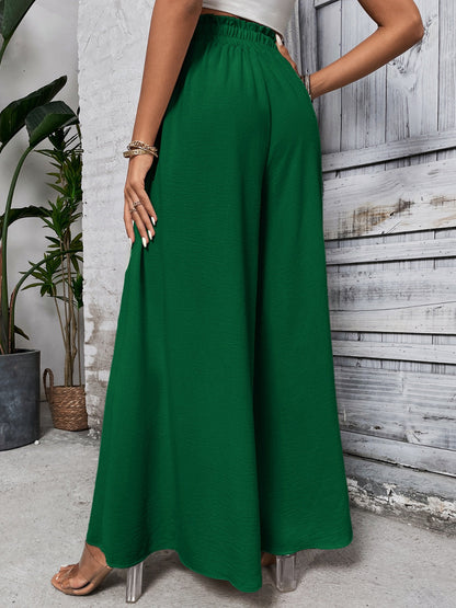 Boho high waist wide leg pants in green cotton, tied style.