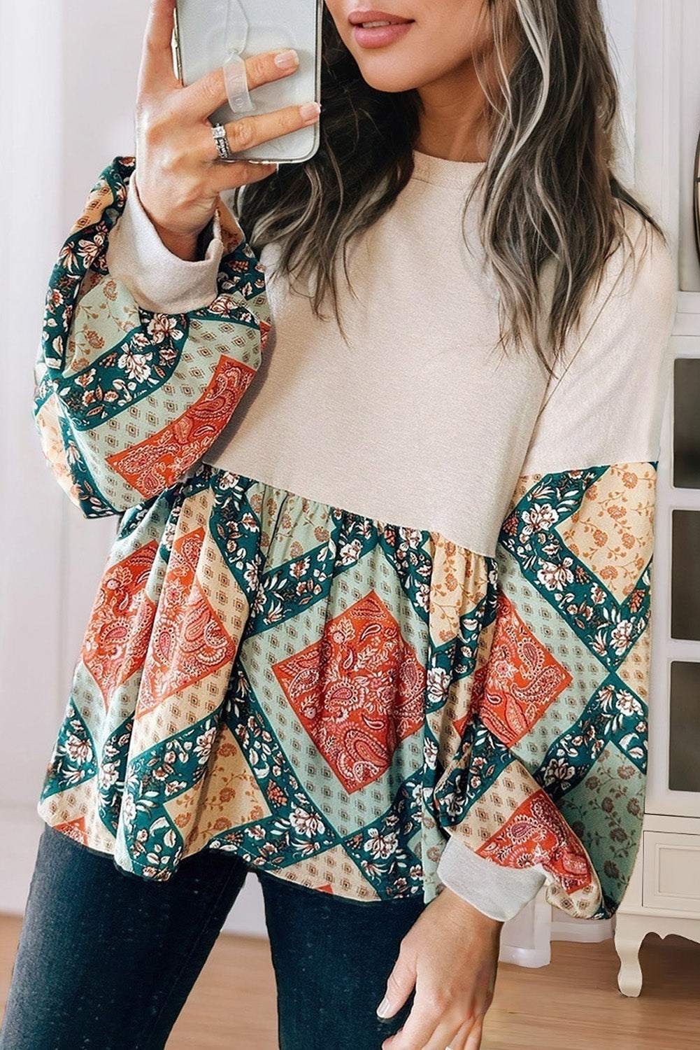 Paisley geometric patchwork loose fit blouse with boho chic patterns and vibrant colors.