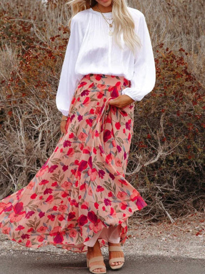 Boho pleated maxi skirt with floral print design.