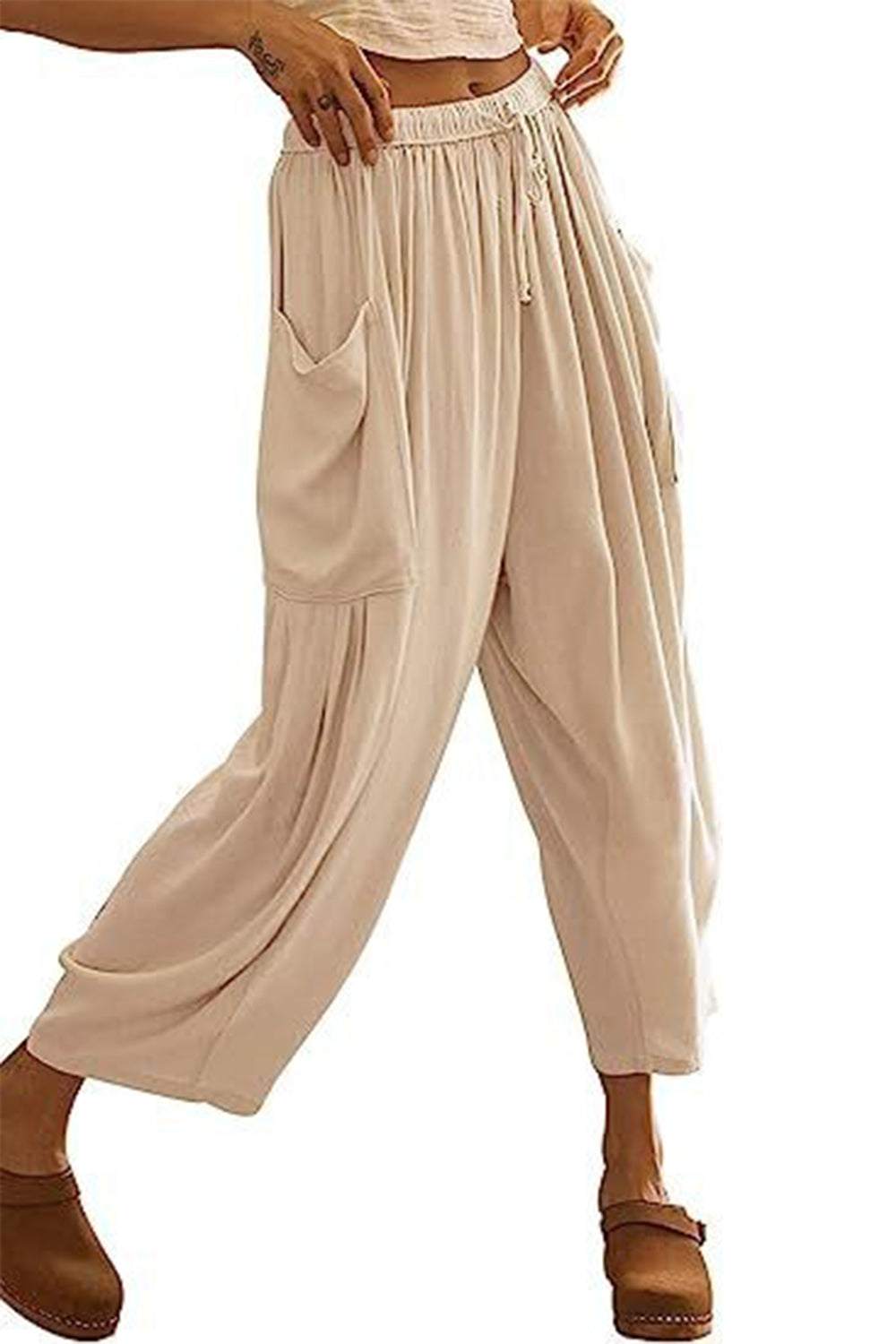 Boho wide leg harem pants with pockets in beige color.