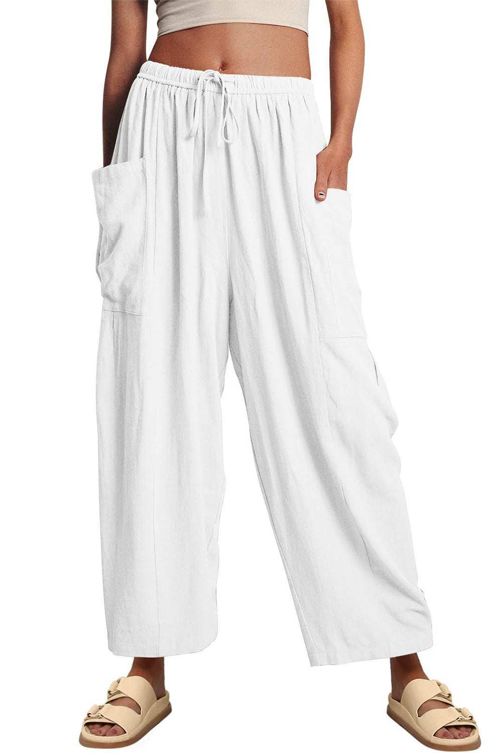 Boho wide leg harem pants with pockets, 100% polyester, opaque, machine washable.