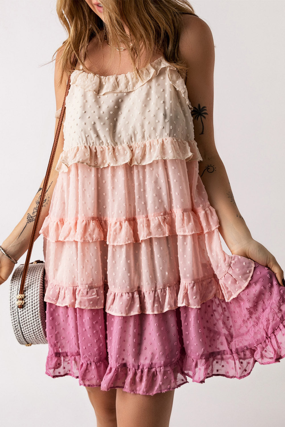 Pink ombre swiss dot ruffled tiered mini dress with shoulder strap design.