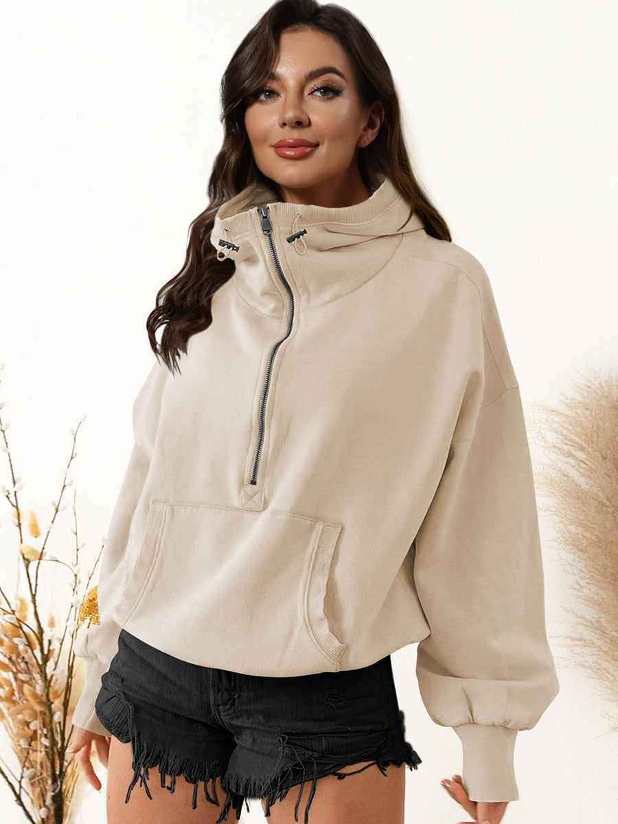 Half zip dropped shoulder hoodie with pockets and drawstring, made of polyester and rayon.