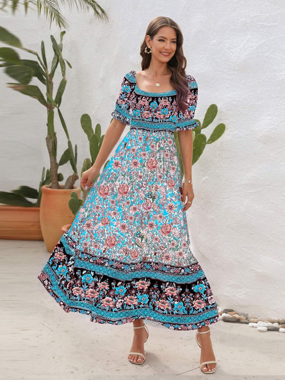 Floral flounce sleeve off shoulder midi dress in vibrant blue and pink pattern.