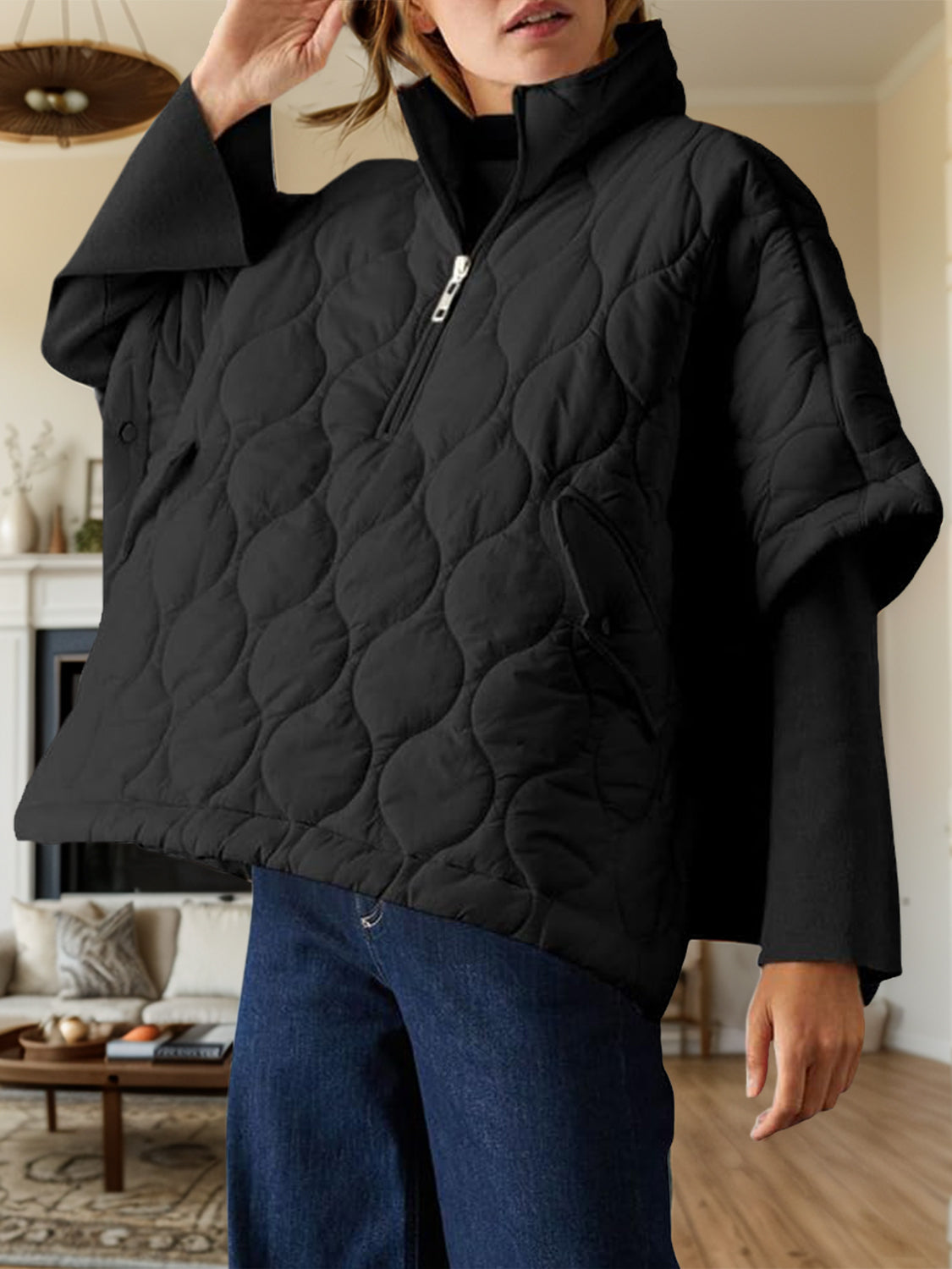 Textured half zip pullover poncho in black, basic style, polyester, lined, wearable indoors.