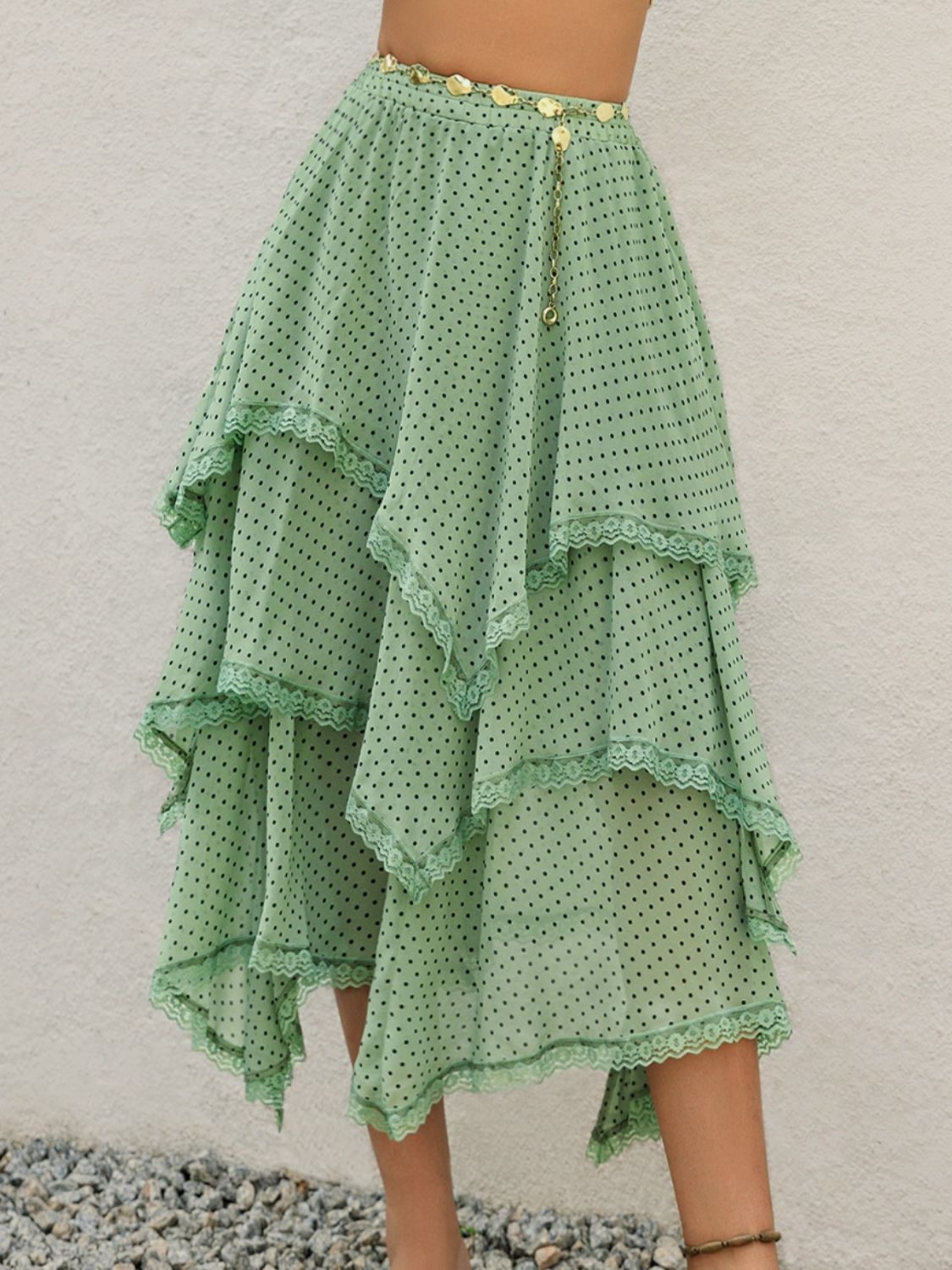 Lace detail layered printed skirt in green with a flowing, tiered design and delicate lace accents.