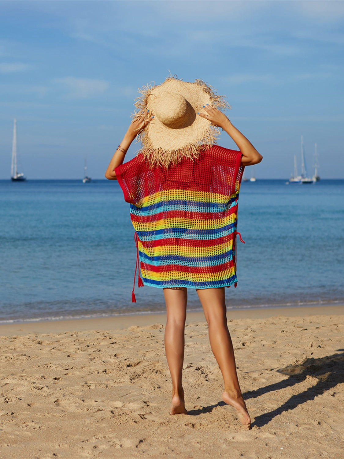 Rainbow cutout striped swim cover with slit and moderate stretch.