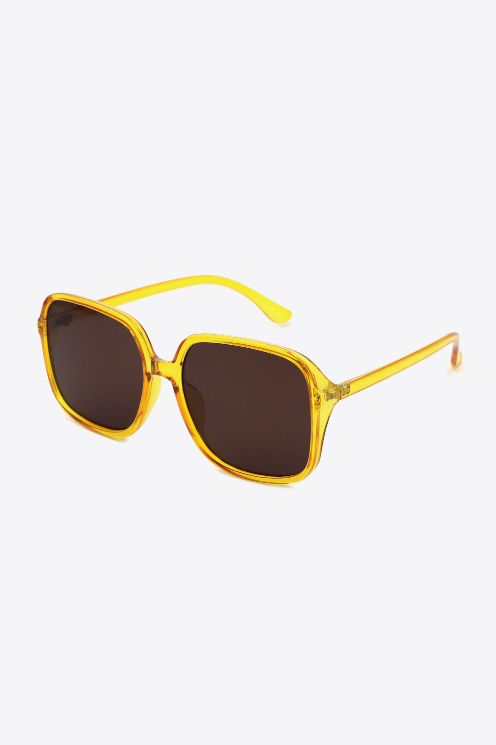 Oversized square sunglasses with UV400 protection and polycarbonate frame.