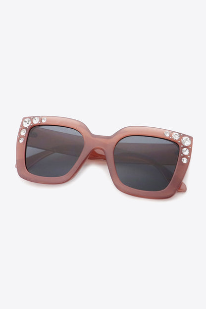 Oversized rhinestone sunglasses with wayfarer shape and UV400 protection.