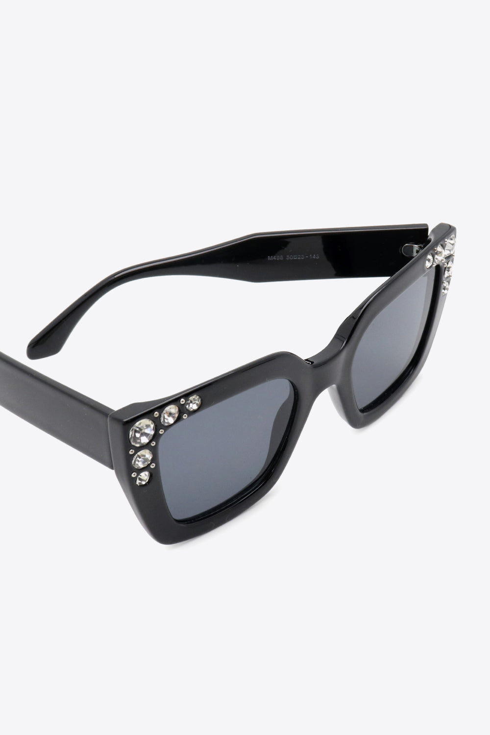 Oversized rhinestone sunglasses with UV400 protection and wayfarer shape.