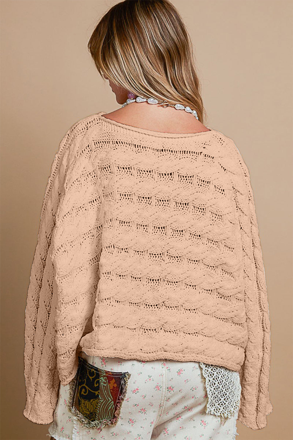 Round Neck Cable Knit Cropped Sweater with twisted cable texture, soft chenille fabric, back view.