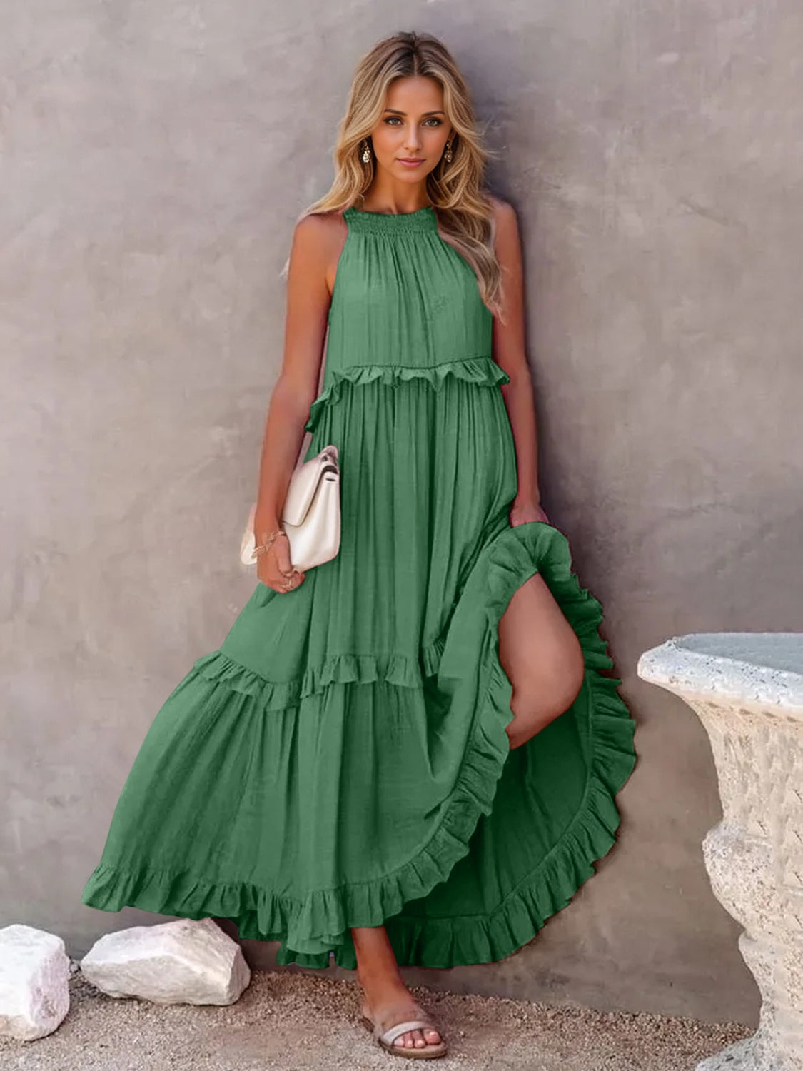 Ruffled sleeveless tiered maxi dress with pockets in green, featuring a high-low design and smocked details.