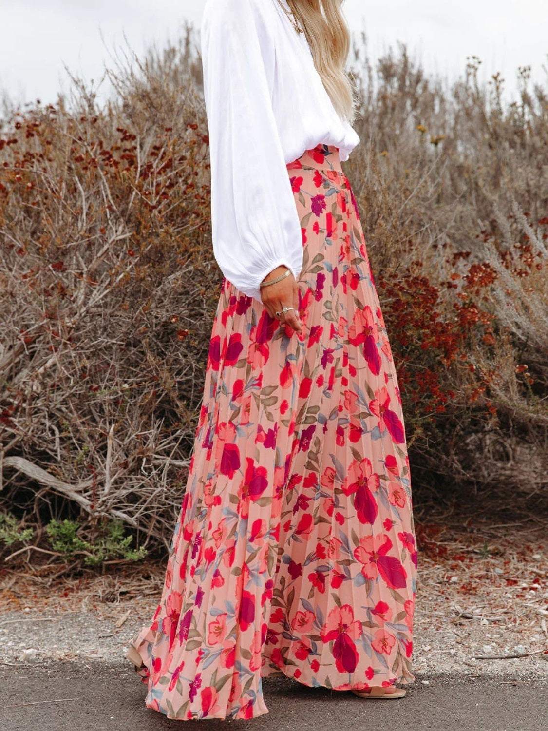 Floral Print Boho Pleated Maxi Skirt with vibrant red and pink flowers.