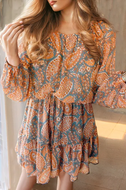 Ruffle Hem Printed Long Sleeve Dress with paisley pattern in orange and teal.