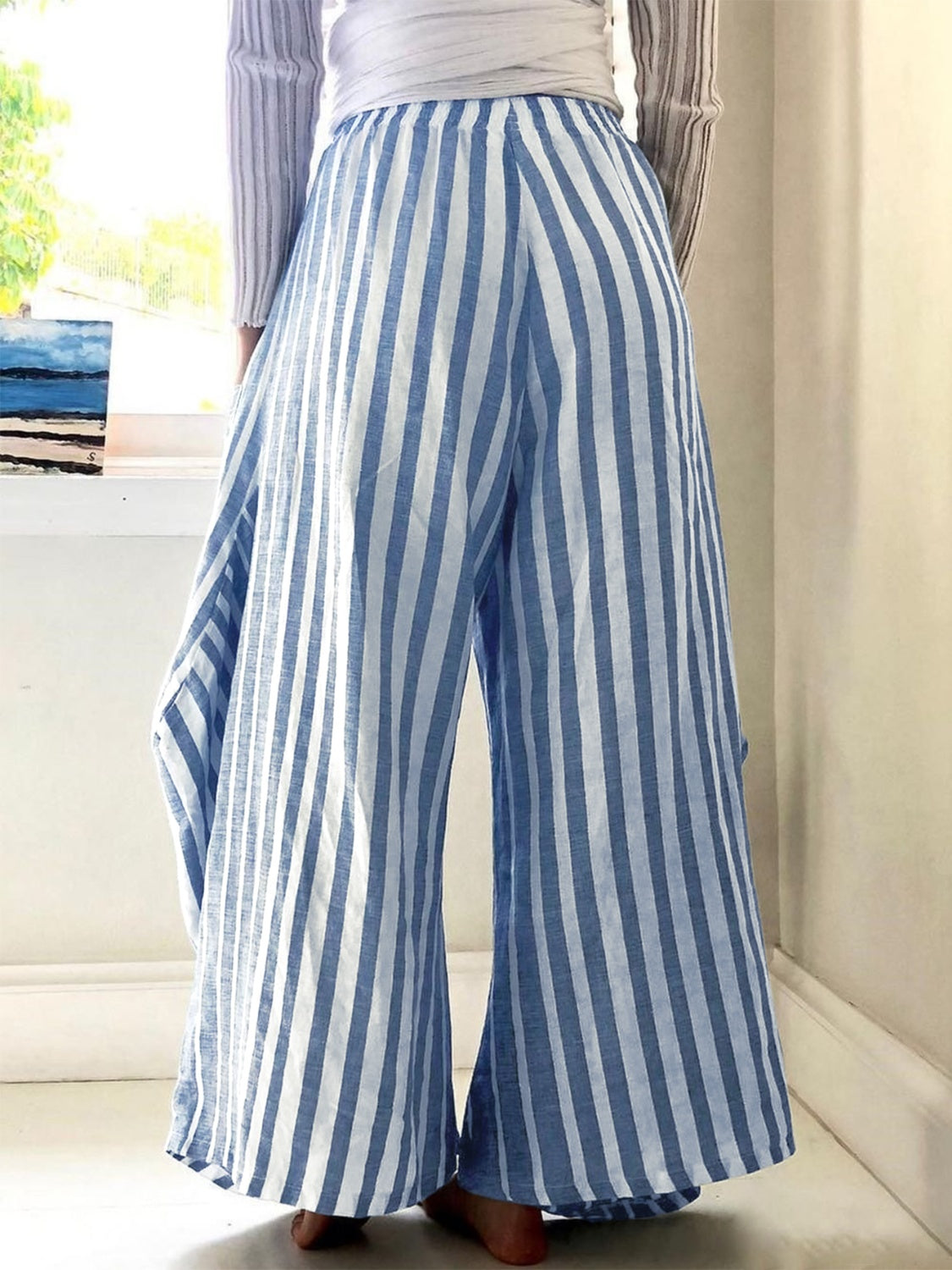 Striped elastic waist wide leg pants, pocketed, opaque, blue and white stripes.