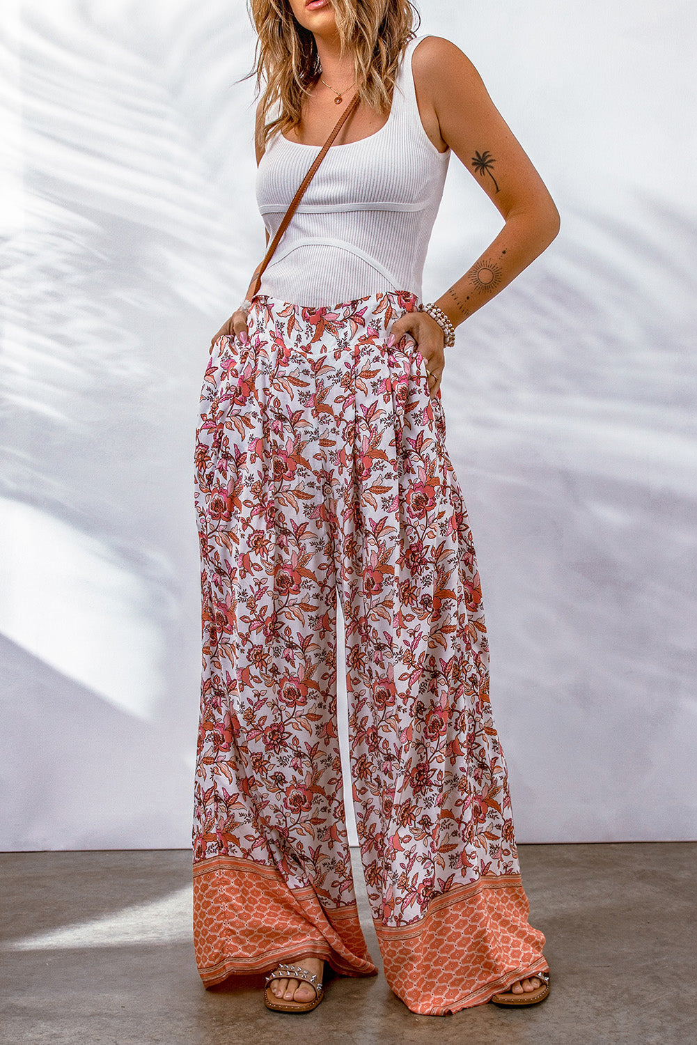 Bohemian pleated wide leg floral pants in viscose material.