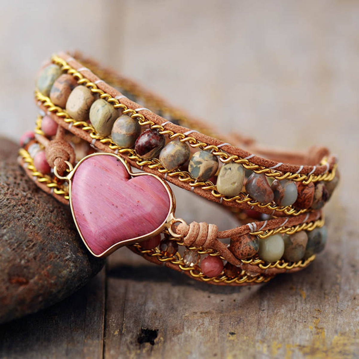 Natural crystal bead bracelet with heart pendant and multicolored stones.