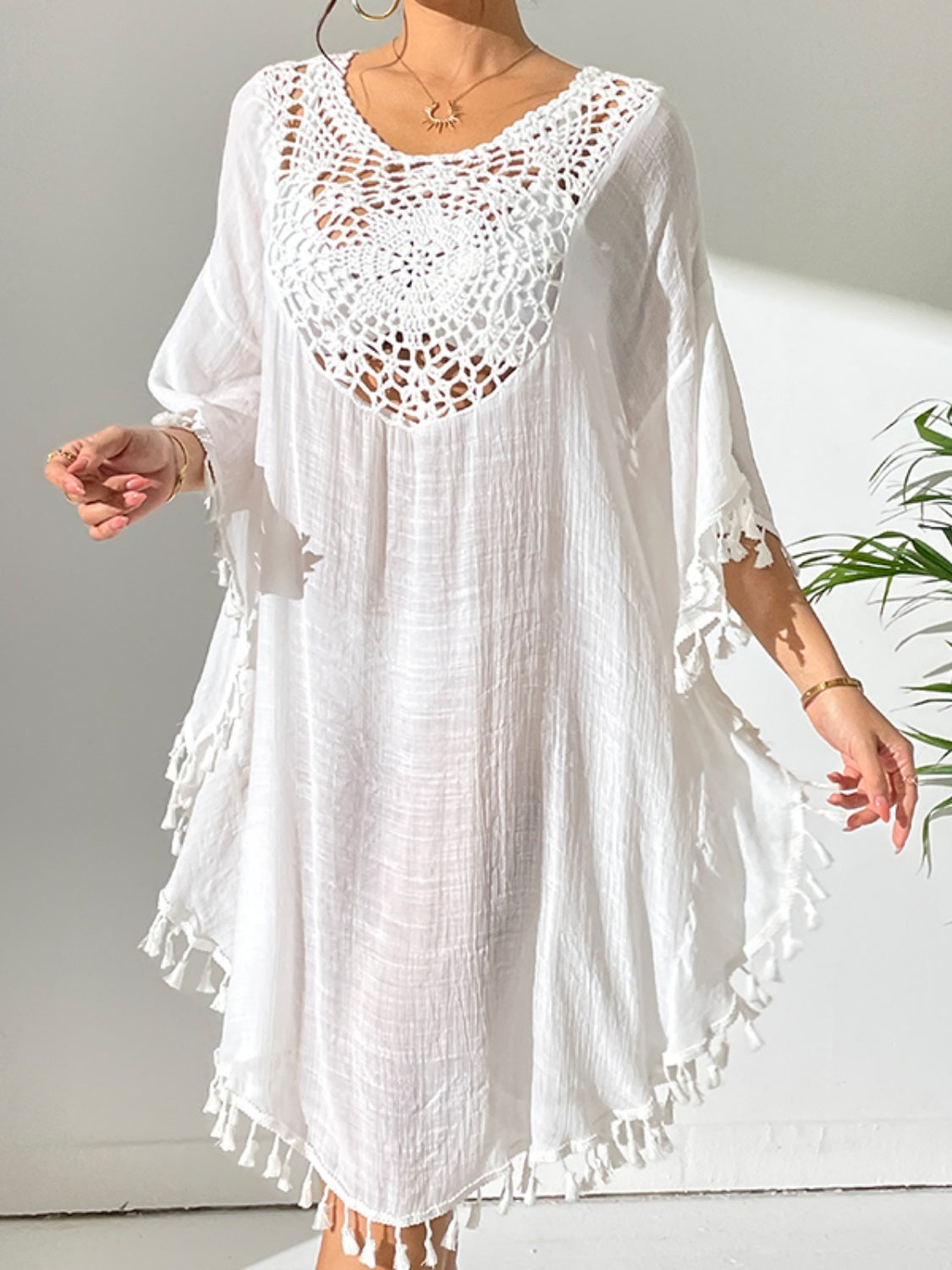 Tassel cutout scoop neck cover-up dress in white, semi-sheer fabric, with crochet detailing, acrylic and polyester blend.