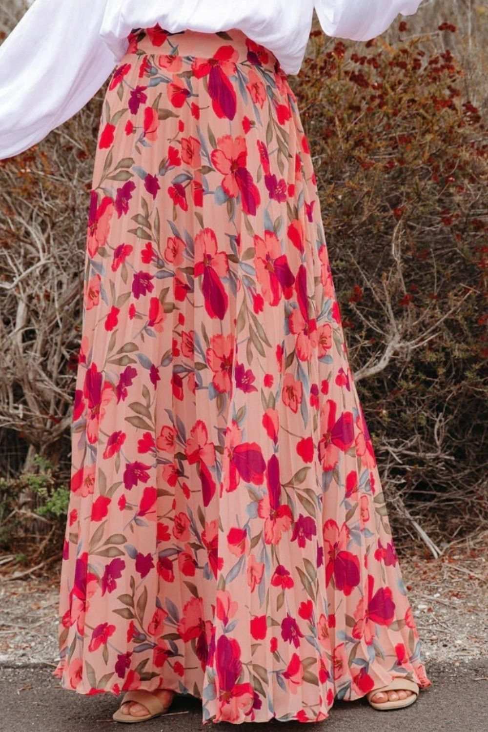 Floral Print Boho Pleated Maxi Skirt with vibrant red and pink flowers.