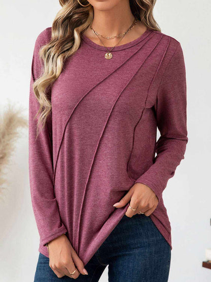 Round neck seam detail long sleeve t-shirt in maroon color.