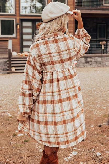 Plaid collared long sleeve mini shirt dress in cotton.