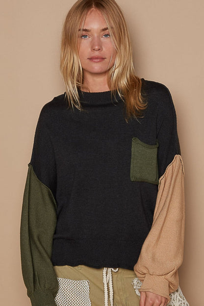 Color Block Roll Hem Hacci Sweater with exposed seam and pocket, featuring a modern design in soft Hacci fabric.