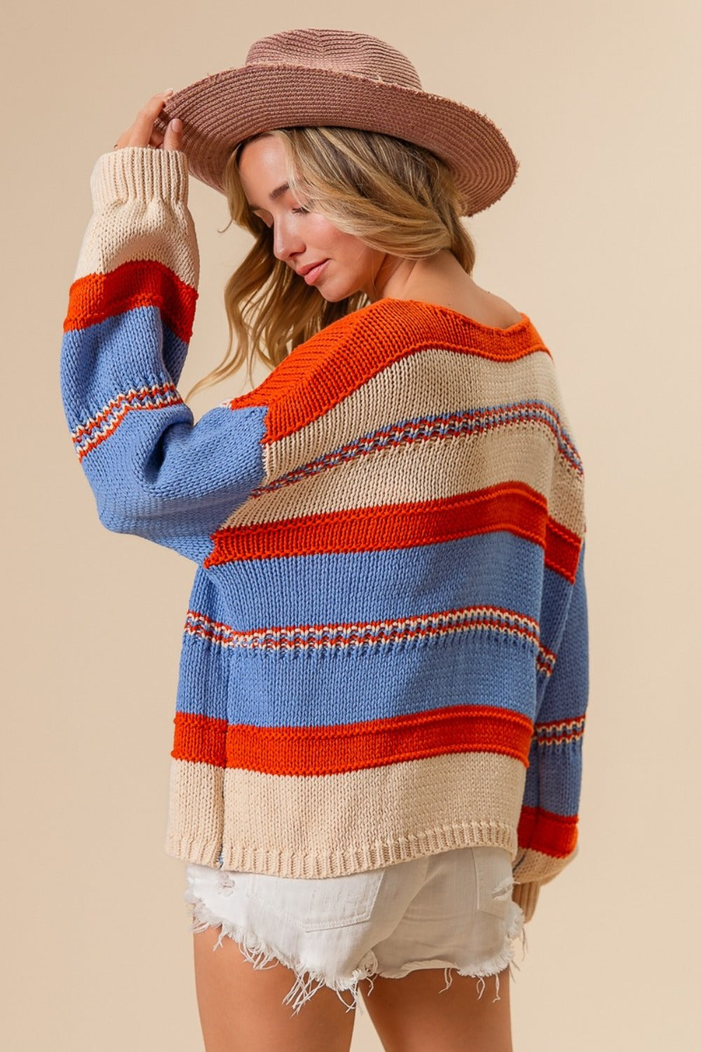 Vibrant striped scoop neck sweater with multicolor design.