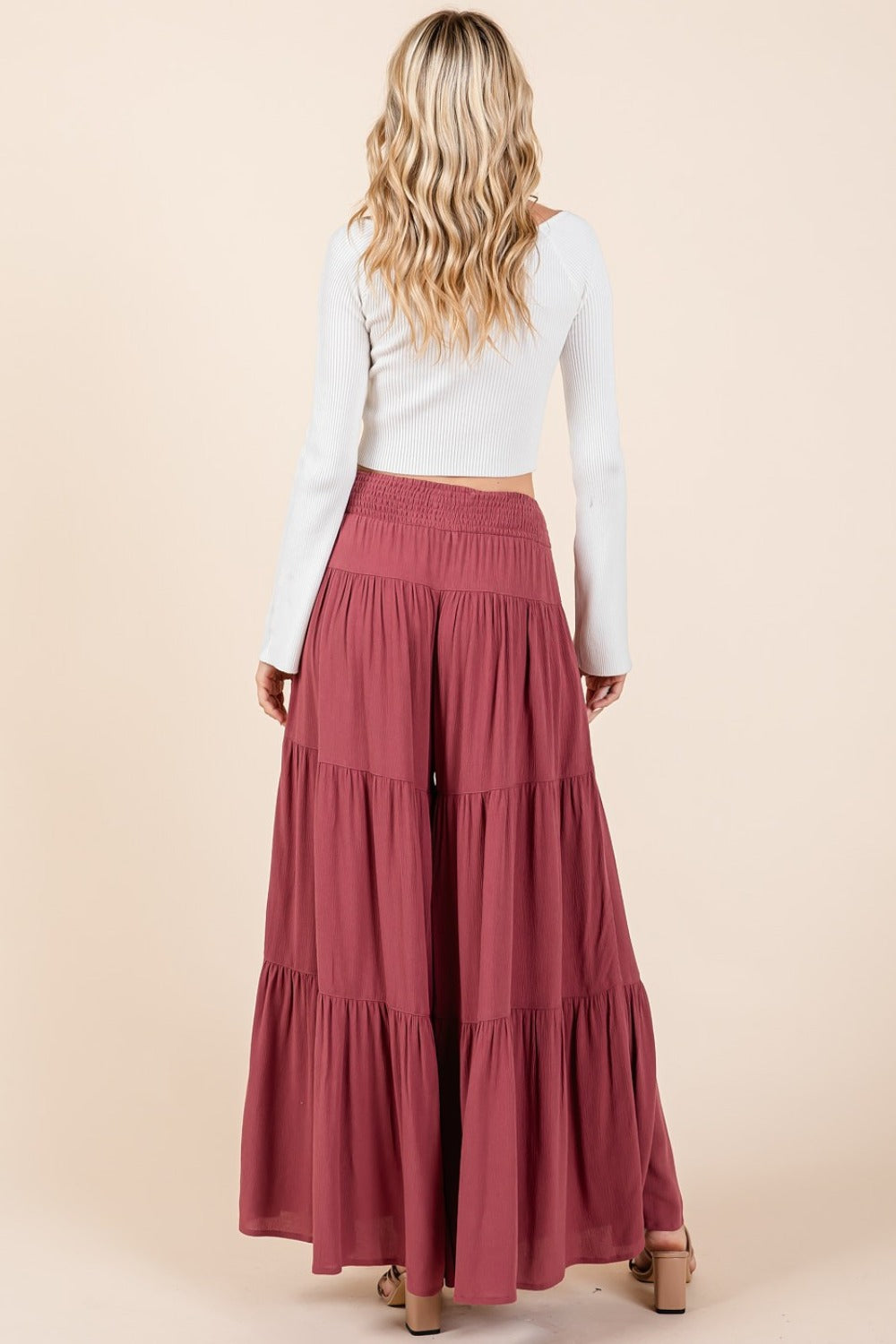 Tier detail smocked elastic waist wide leg pants in lightweight crepe, back view.