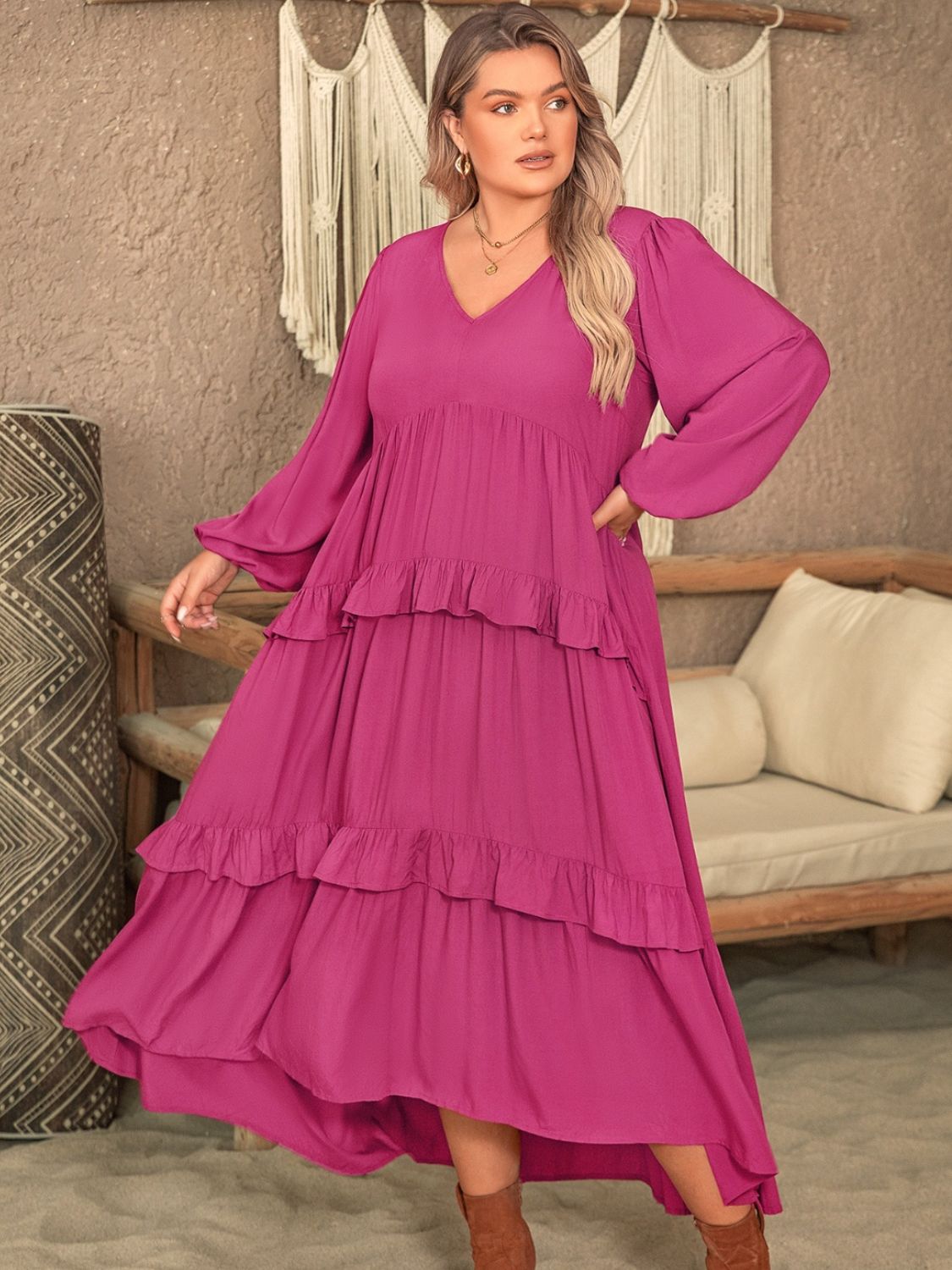 Plus size ruffled V-neck long sleeve dress in magenta fabric.