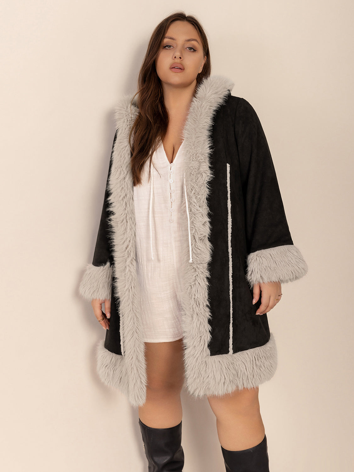 Plus size fuzzy trim open front long sleeve hooded coat with raw hem.